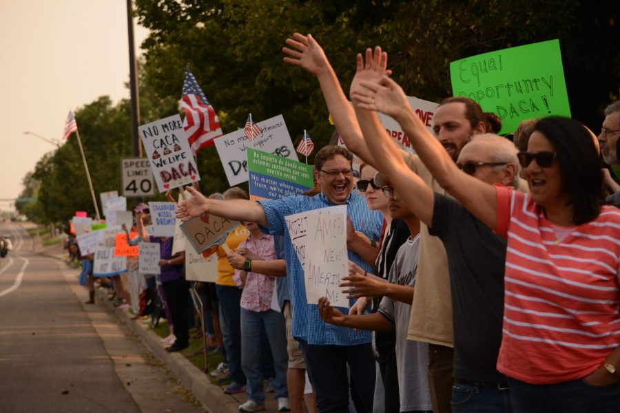 Early September 2017, Fort Collins community members cheer at a DACA solidarity rally outside Cory Gardner's office after finding out the senator signed in support of the DACA program. (Maya Shoup | Collegian)