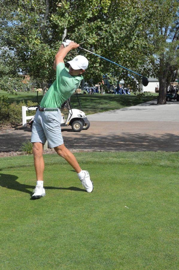 Sophomore AJ Ott finishes a swing during a practice round at Fort Collins Country Club. (AJ Frankson | Collegian)
