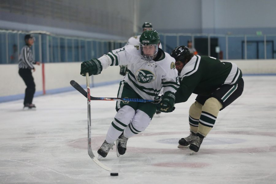 Forward Alec Orme moves the puck down the ice into  Eastern Michigan Territory on Sept 29 at the EPIC Center in Fort Collins. The Rams Hockey Team fell to the Eastern Michigan Eagles 4-1. (Elliott Jerge | Collegian)