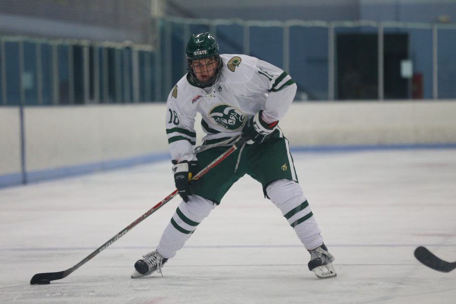 Forward Jonathon Johnson winds up to take a shot against Eastern Michigan on Sept 29 at the EPIC Center in Fort Collins. The Rams Hockey Team fell to the Eastern Michigan Eagles 4-1. (Elliott Jerge | Collegian)