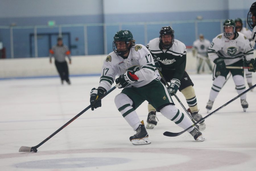 Forward Christopher Nitchen moves the puck down the ice into  Eastern Michigan Territory on Sept 29 at the EPIC Center in Fort Collins. The Rams Hockey Team fell to the Eastern Michigan Eagles 4-1. (Elliott Jerge | Collegian)