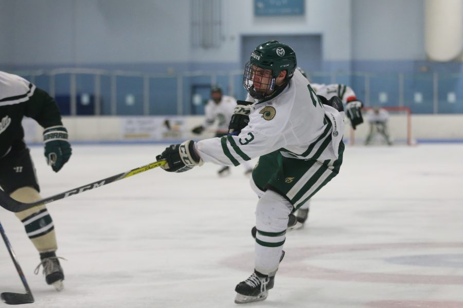 Defender Riley Defazio takes a shot against Eastern Michigan during the third period on Sept 29. The Rams Hockey Team fell to the Eastern Michigan Eagles 4-1. (Elliott Jerge | Collegian)