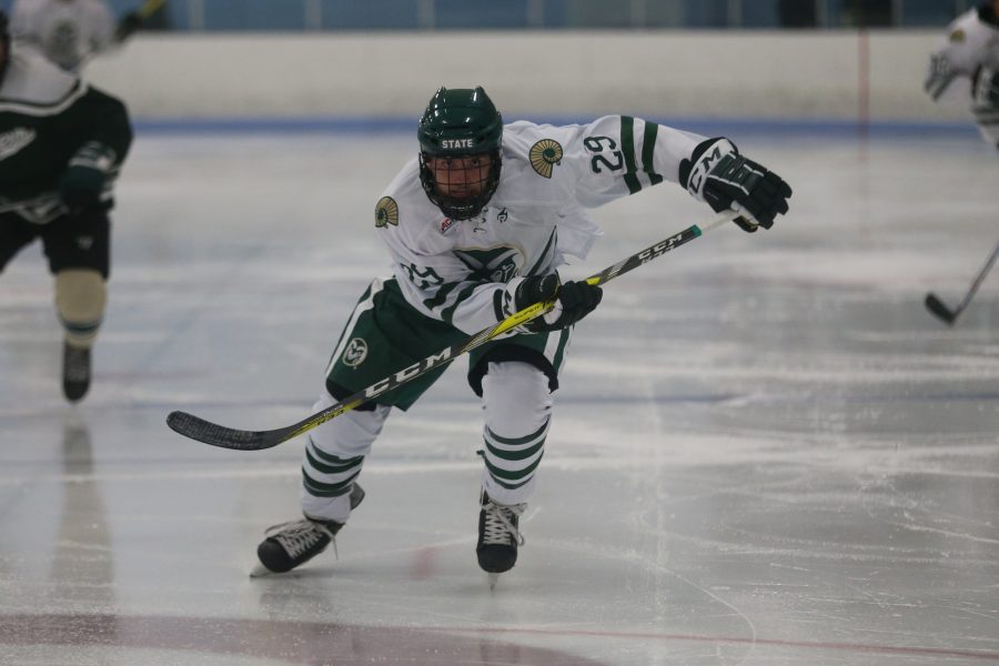 Forward Austin Ansay chases down a loose puck into Eastern Michigan territory on Sept 29. The Rams Hockey Team fell to the Eastern Michigan Eagles 4-1. (Elliott Jerge | Collegian)