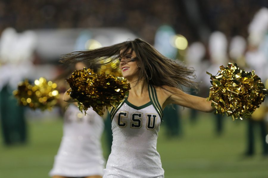 The Colorado State University cheerleaders perform for the crowd during the thrid quarter of the game on Friday night. (Forrest Czarnecki | Collegian)