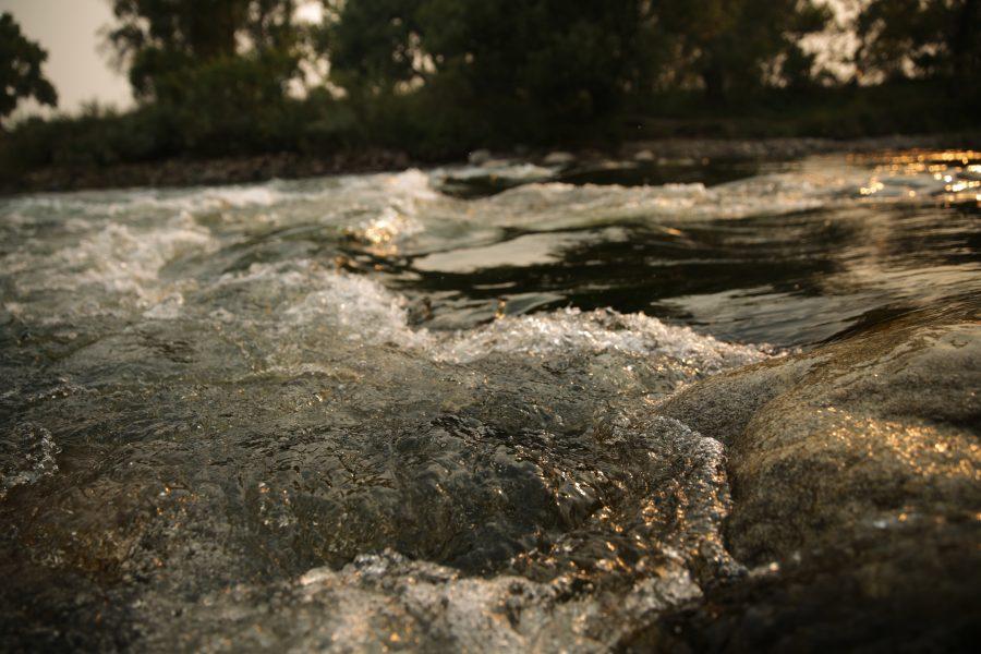 The Poudre River is pictured at sunset as it flows through Fort Collins on September 4th. (Forrest Czarnecki | The Collegian)