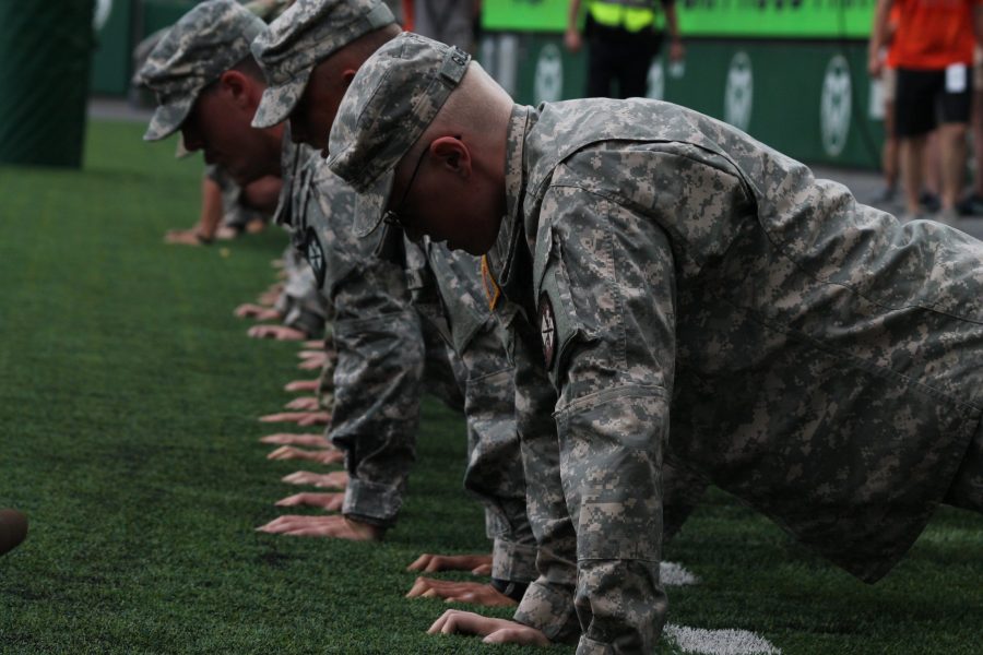 Members of Colorado State University ROTC do pushups every time the football team scores (Seth Bodine | Collegian) 