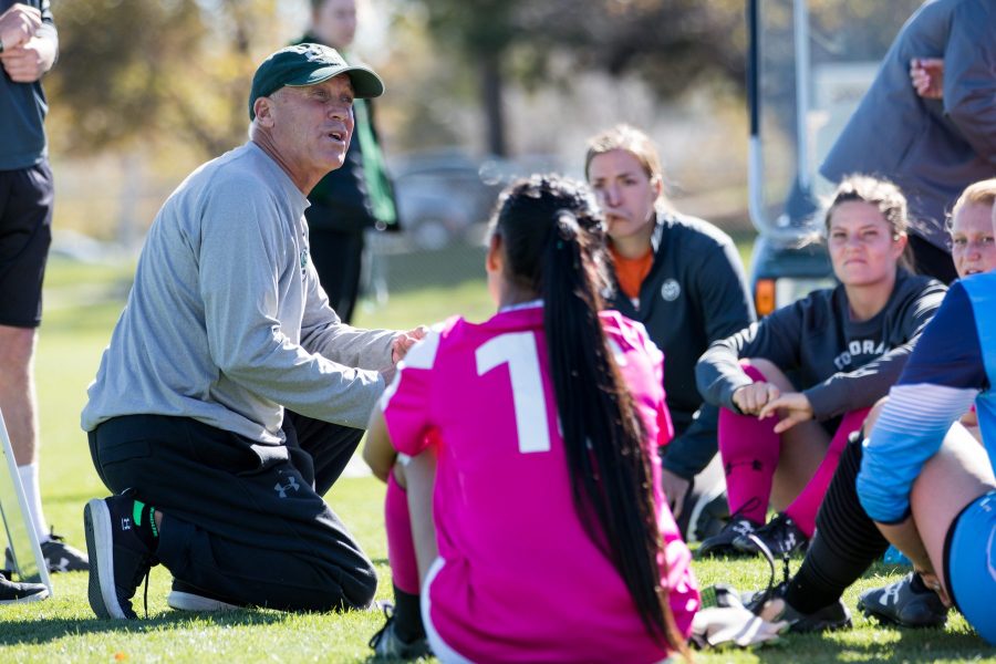 Head coach Bill Hempen talks to the womens soccer team at half time during the game against Utah State. (Jordan Reyes | Collegian)