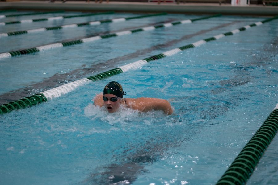 A Colorado State swimmer participates in the butterfly event against the University of Denver on Oct. 21. The Rams were defeated by the Pioneers. (Erica Giesenhagen | Collegian)