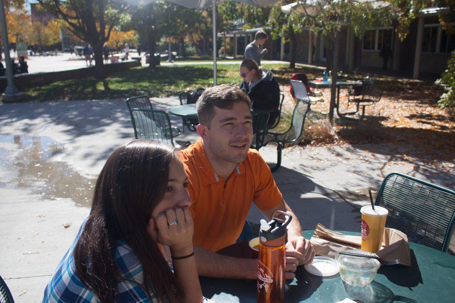 Graduate students Jackie Ruero (left) and Garrett Carrica (right) sit at a table together eating food from Spoons. Jackie is a second year vetrinary medicine major, and Garrett is a second year premed student. (Jenny Lee | Collegian)