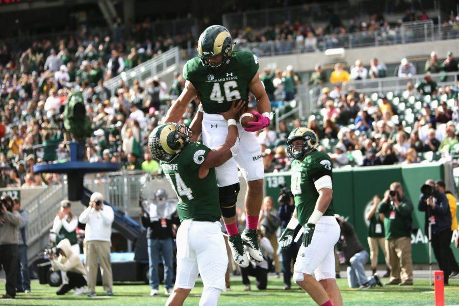 CSU cornerback Anthony Hawkins (14) and fullback Adam Prentice (46) celebrate in the endzone after scoring against Air Force on Saturday, Oct 28. The Rams lost at home 45-28. (Davis Bonner | Collegian)