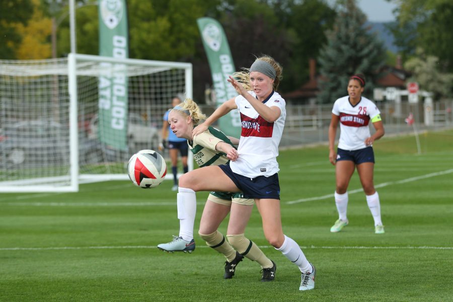 Forward Ally Murphy-Pauletto battles for a loose ball with a Fresno State defender during the second half of action on Oct 1. (Elliott Jerge | Collegian)