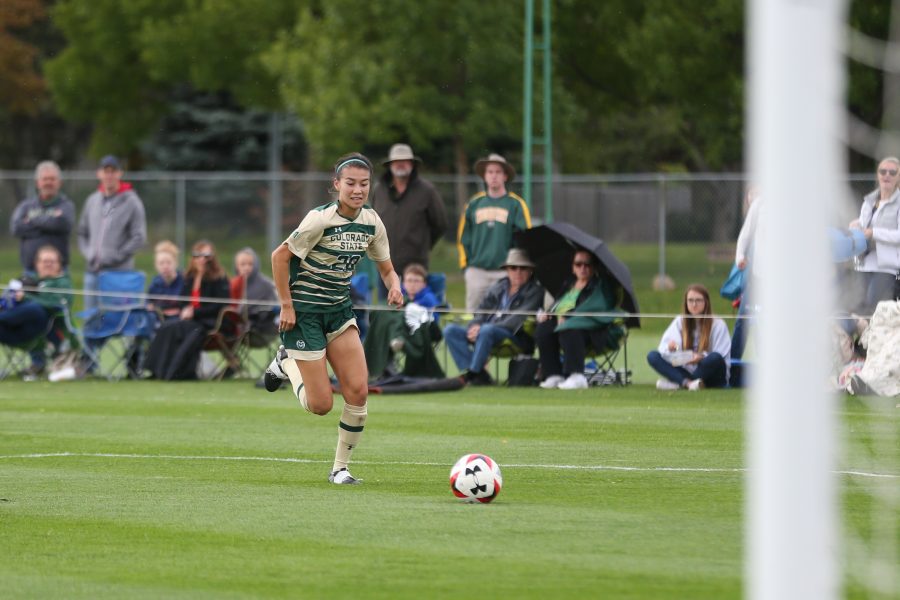 Midfielder Janelle Stone moves the ball into Fresno State Territory during the first half of action on Oct 1. The Rams are currently 2-5-4 on the season. (Elliott Jerge | Collegian)