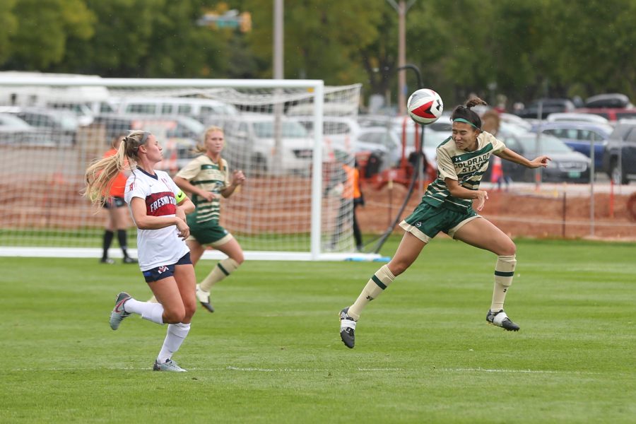Midfielder Janelle Stone heads the ball during the second half of action against the Fresno State Bulldogs on Oct 1. (Elliott Jerge | Collegian)
