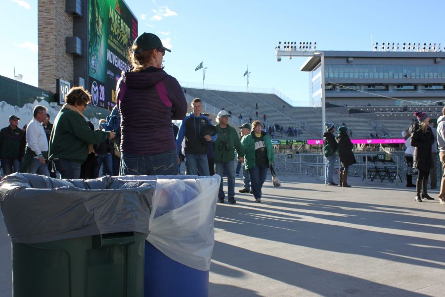 Two bins stand by the exits of the stadium. As fans leave their trash in these bins, the Zero waste team goes through and separates the different types of materials to maximize the amount material composted and recycled.(Brandon Mendoza| Collegian)