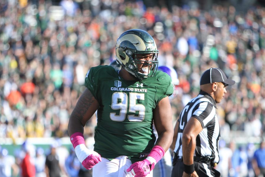 Defensive lineman Richard King (95) celebrates after CSU was able to take possession of the ball. (Tony Villalobos May