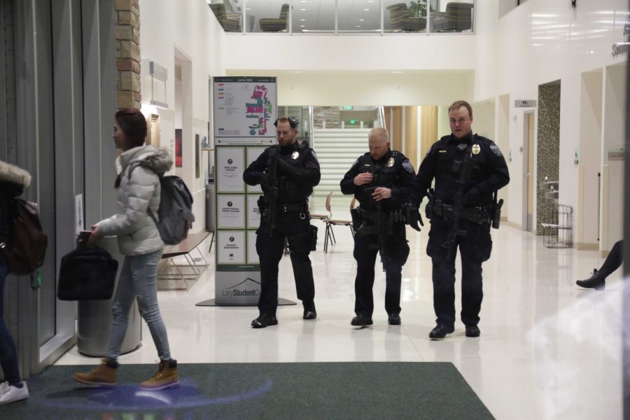 CSUPD officers sweep the LSC looking for suspects of a bomb threat in Morgan Library on campus. (Davis Bonner | Collegian)