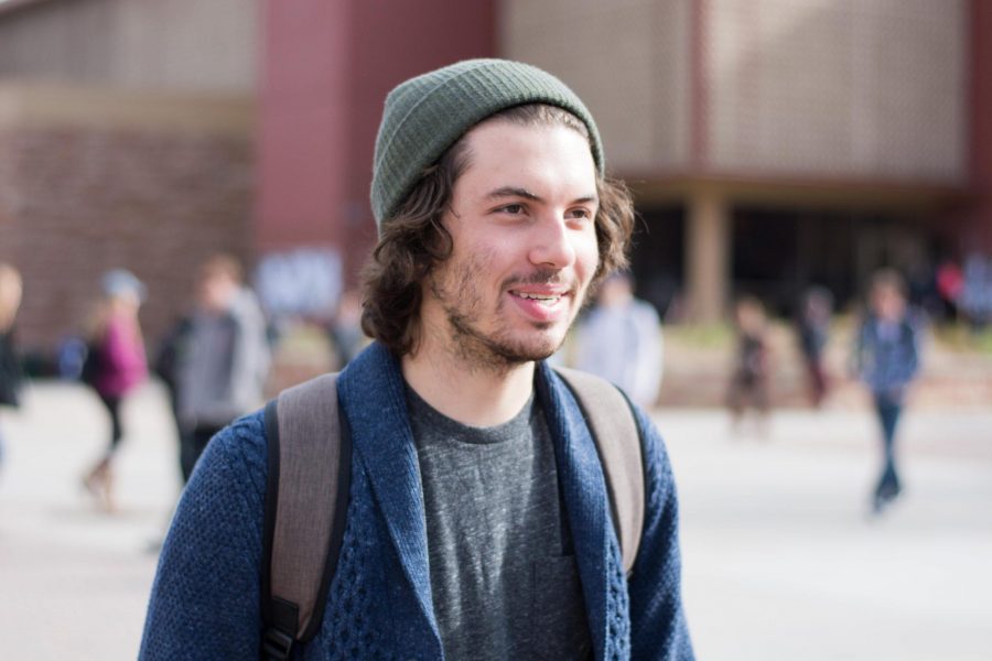 Hans Vanags, a Philosophy major and freshman at CSU, describes the benefits of watching movies. Han’s enjoys watching movies because “he likes seeing other peoples’ stories and they help fuel his creativity.” (Colin Shepherd | Collegian)