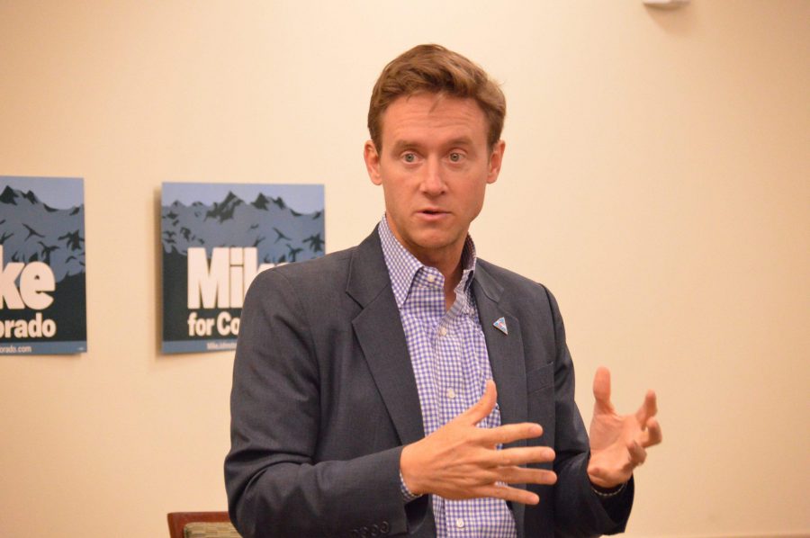 Former Sen. Mike Johnston talks about his past as a principal and senator at Pizza and Politics in the LSC Nov. 8. (AJ Frankson | Collegian)
