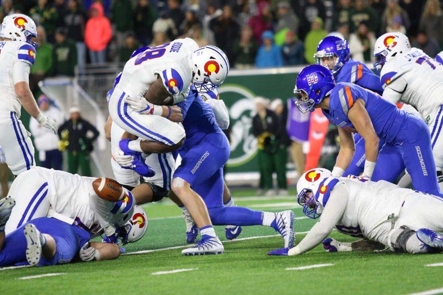 Running back Rashaad Boddie fumbles the ball in overtime against Boise State, a turnover that gave Boise state the win in overtime, 59-52. (Jack Starkebaum | Collegian)