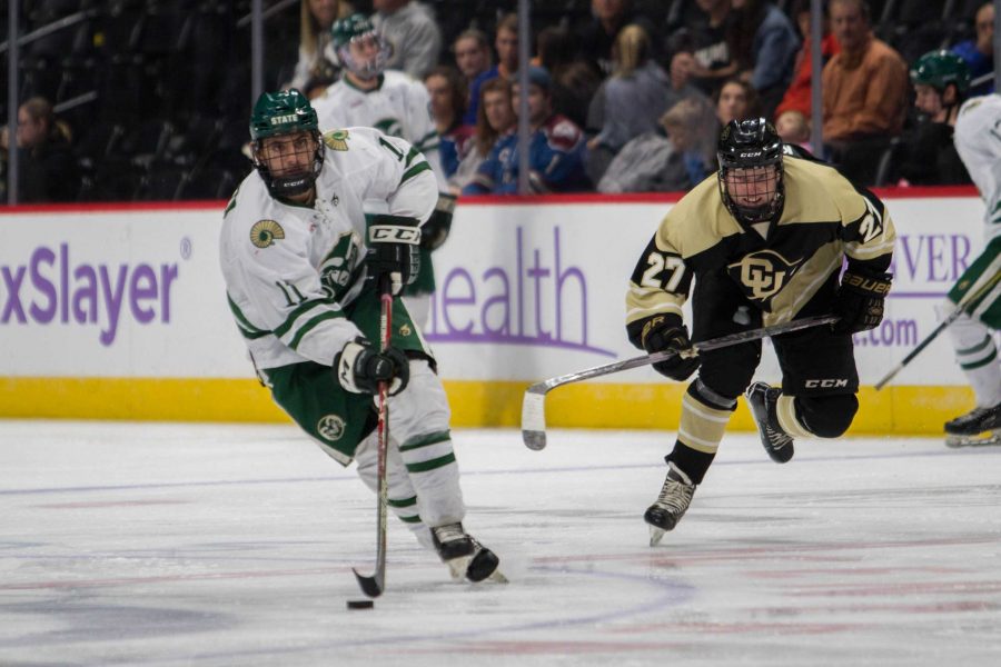 Forward, Elijah Aquilina, skates past a Buffs defender during the Center Ice Showdown at the Pepsi Center on Sunday, Nov. 12. The Rams are down 1-0 in the first period. (Ashley Potts | Collegian)