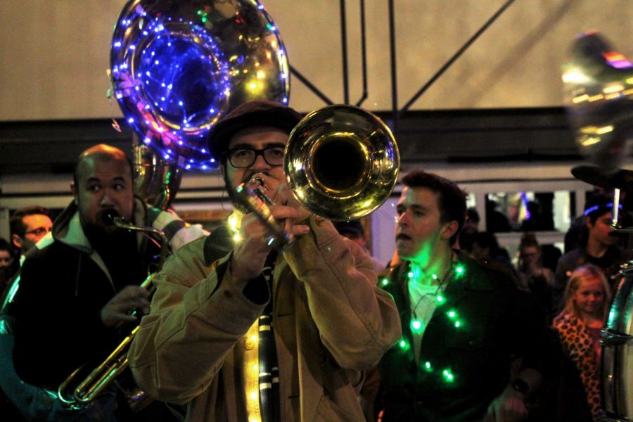 Guerrilla Fanfare is a funky marching band that do a lot of mobile gigs for various events. They led the mile long parade from Old Town Square to the new Lyric theater and were a huge hit. (Sarah Ehrlich | Collegian) 