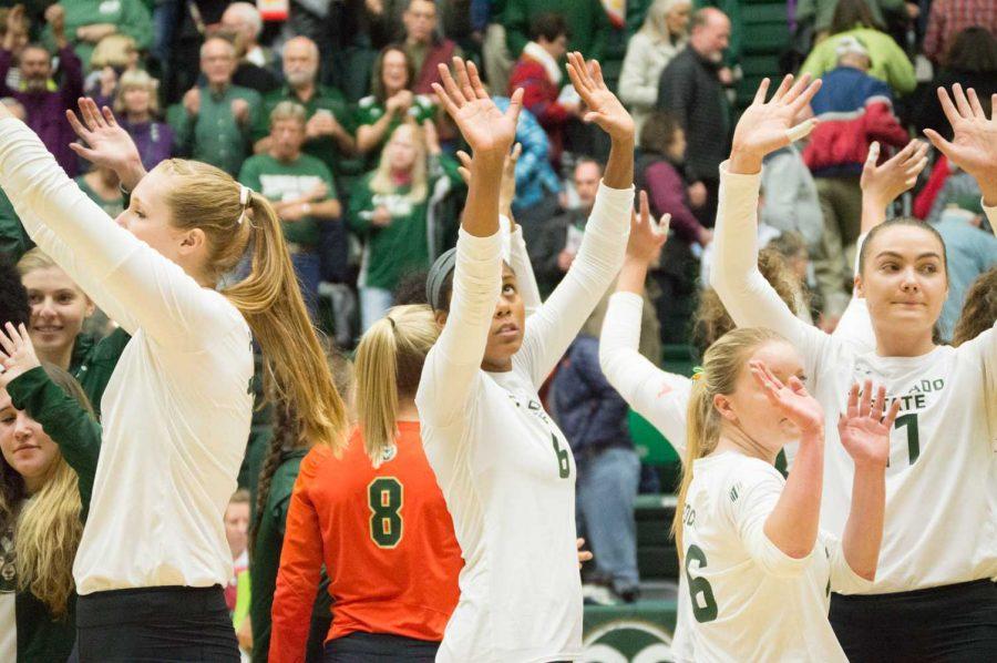 CSU volleyball team waves to the crowd after their victory against Fresno Wednesday night. Photo by Olive Ancell | Collegian
