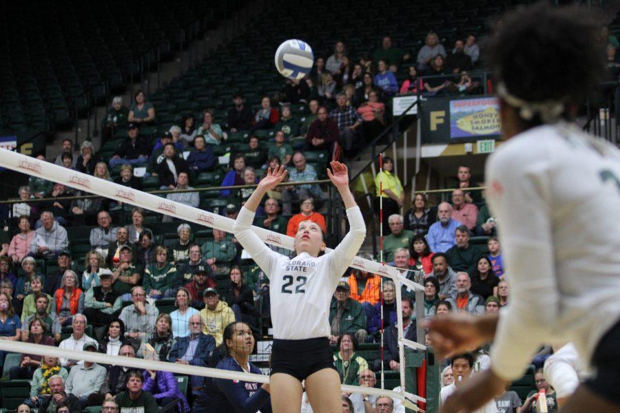Sophomore Katie Oleksak sets a teammate during the CSU vs. Fresno State volleyball game. The Rams swept the Bulldogs on Nov. 15. (Joshua Contreras | Collegian)