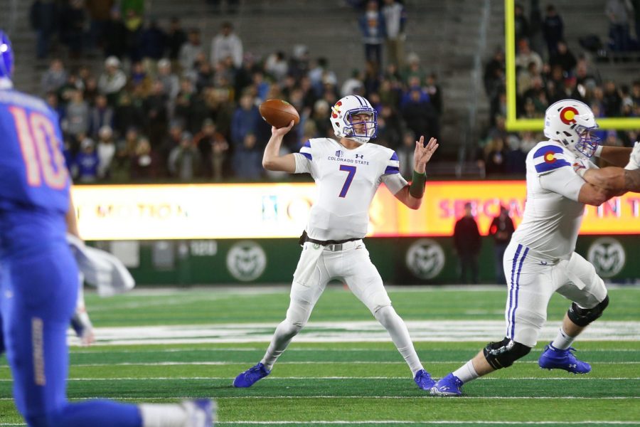 Colorado State Quarterback Nick Stevens throws a pass to an open receiver during the first quarter of play against the Boise State Broncos on Nov. 11. (Elliott Jerge | Collegian)