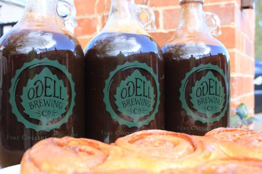 Growlers with cinnamon roles in front of them. (Photo courtesy of Silver Grill Cafe)