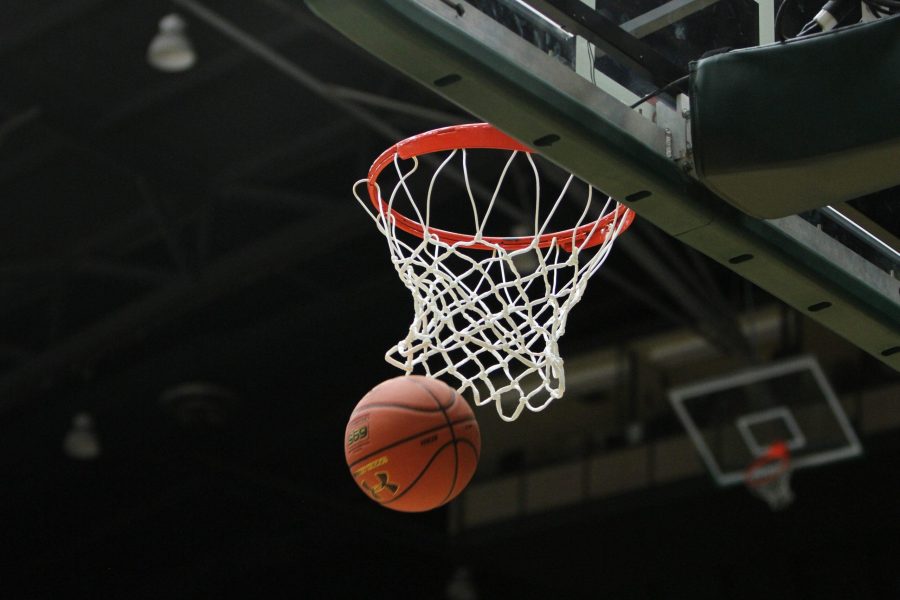 A basketball falls through the net following a score from CSU against the Gonzaga Bulldogs Nov 13. (Tony Villalobos May | Collegian)