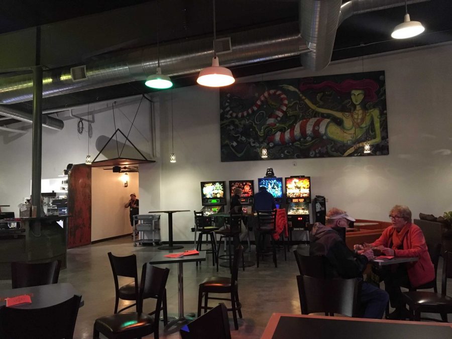 The lobby of the Lyric is a spcious area complete with two food and drink bars, plenty of seating and of course pinball and art. The employees of the . lyric hope they can turn their business into a place to be for more than just a movie.
 (Sarah Ehrlich | Collegian)