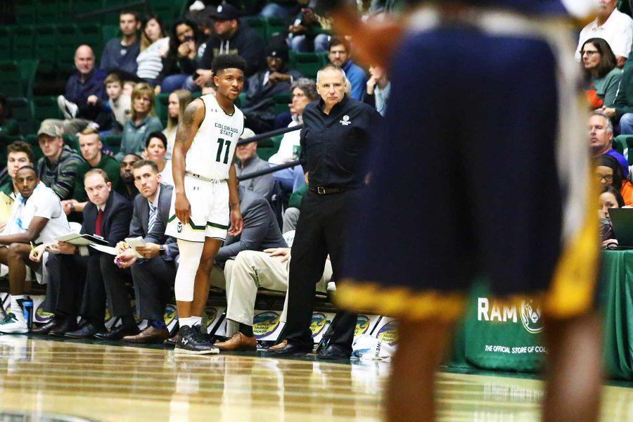 Junior guard Prentiss Nixon (11) talks with head coach Larry Eustachy during a free throw in the first half of the Rams 83-79 win over UNC. (Javon Harris | Collegian)