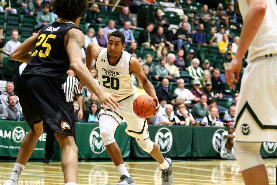 Junior Deion James (20) drives to the basket during the second half of the Rams 80-76 win over Winthrop on Nov. 14 at Moby Arena. (Javon Harris | Collegian)