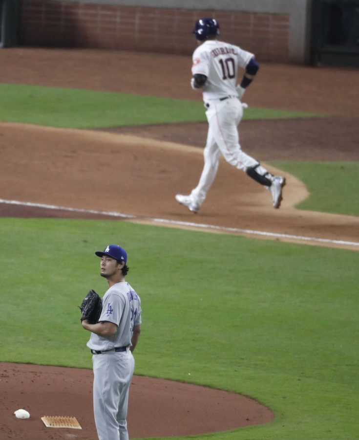 Los Angeles Dodgers pitcher Yu Darvish looks to the outfield as the Houston Astros Yuli Gurriel runs out his home run in the second inning during Game 3 of the 2017 World Series at Minute Maid Park. Minutes later, Gurriel made a racist gesture towards Darvish. (Robert Gauthier/Los Angeles Times/TNS)
