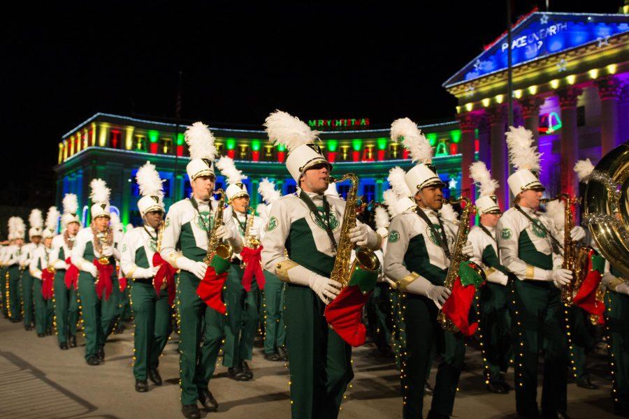 Colorado State University begins the 43rd annual Parade of Lights on December 1, 2017, with performances by the marching band, winter guard, and the cheerleaders. (Colin Shepherd | Collegian)