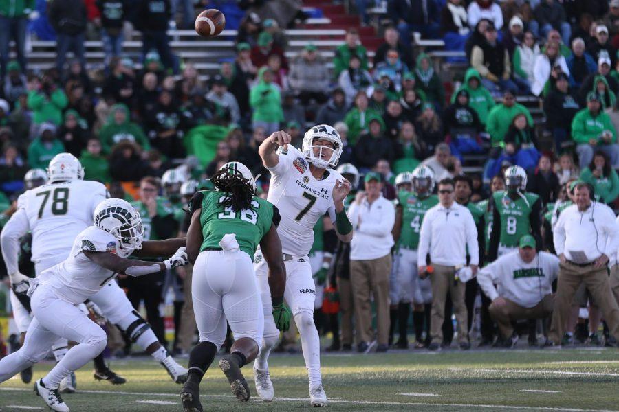 Quarterback Nick Stevens throws a pass to an open receiver during the second quarter of play against the Marshall Thundering Herd in the Gildan New Mexico Bowl on Dec. 16. (Elliott Jerge | Collegian)