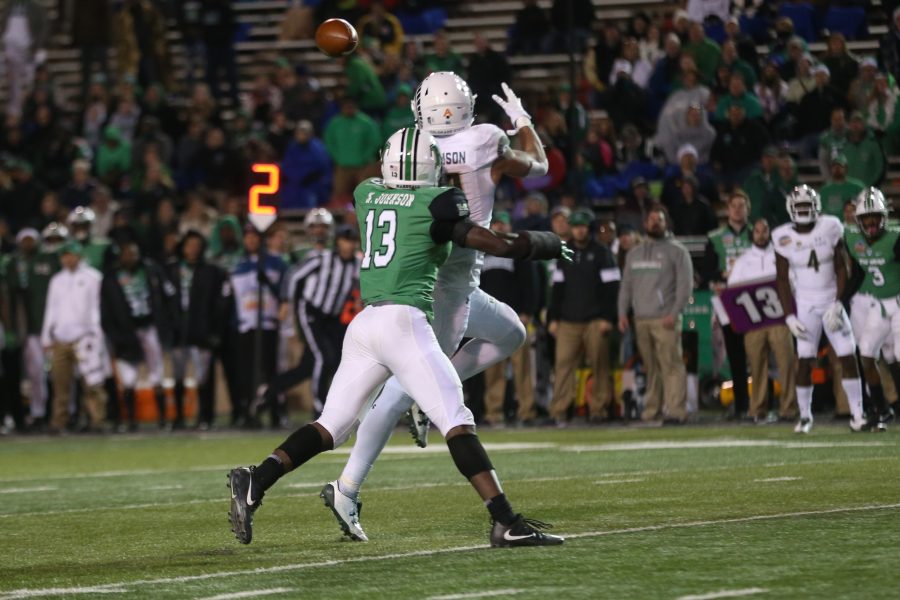 Wide receiver Olabisi Johnson makes a catch from a pass by Nick Stevens during the third quarter against the Marshall Thundering Herd in the Gildan New Mexico Bowl on Dec. 16. (Elliott Jerge | Collegian)