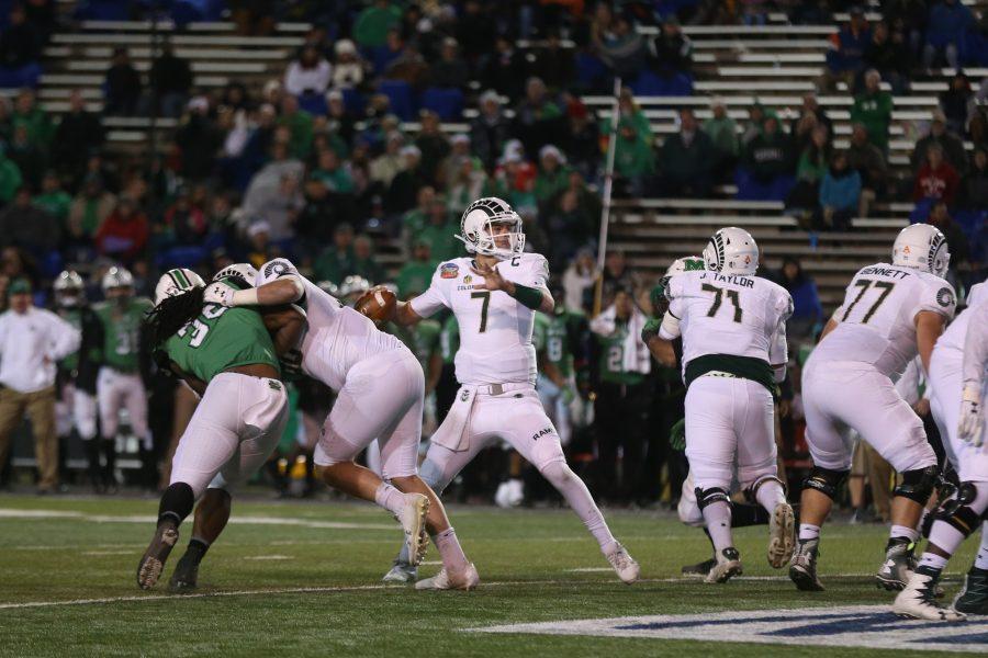 Quarterback Nick Stevens throws a pass to an open receiver during the third quarter of play against the Marshall Thundering Herd in the Gildan New Mexico Bowl on Dec. 16. (Elliott Jerge | Collegian)