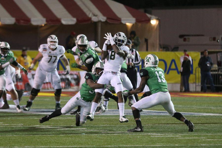 Wide receiver Detrich Clark makes a catch in the fourth quarter of play against the Marshall Thundering Herd in the Gildan New Mexico Bowl on Dec. 16. (Elliott Jerge | Collegian)