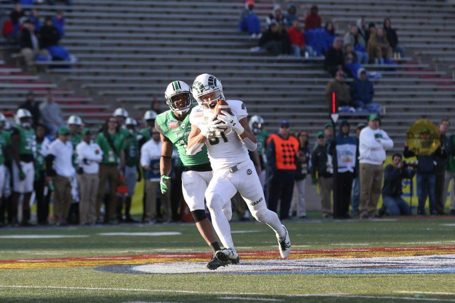 Wide Receiver Olabisi Johnson pulls in a long pass from Quarterback Nick Stevens during the second quarter of play against the Marshall Thundering Herd in the Gildan New Mexico Bowl on Dec. 16. (Elliott Jerge | Collegian)