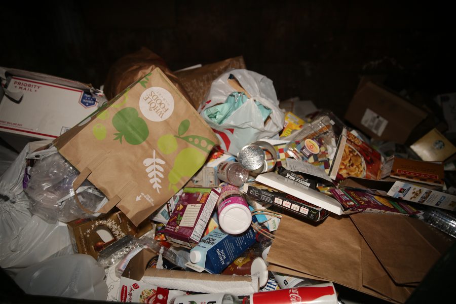 Assorted pieces of recycling are pictured in a Waste Management recycling container in Fort Collins on December 9, 2017. (Forrest Czarnecki | The Collegian)