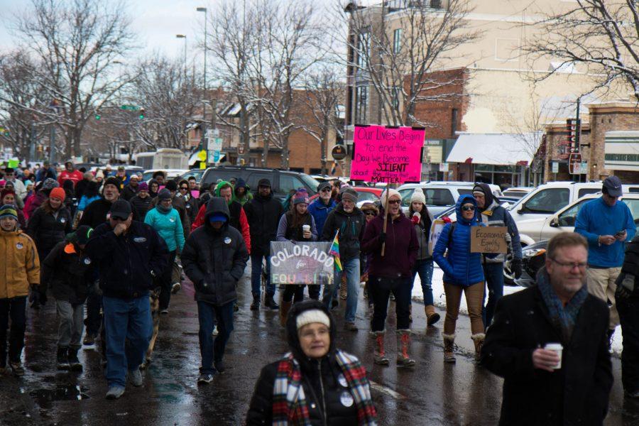 Around 800 people march down College Avenue for the annual Martin Luther King Jr March. (Julia Trowbridge | Collegian)