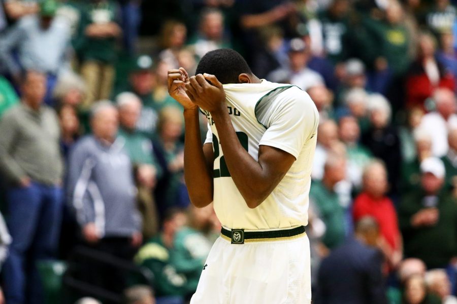 Junior guard J.D. Paige buries his face in his jersey in frustration on Jan. 6. The Rams were defeated by the Bulldogs in overtime. (Javon Harris | Collegian).