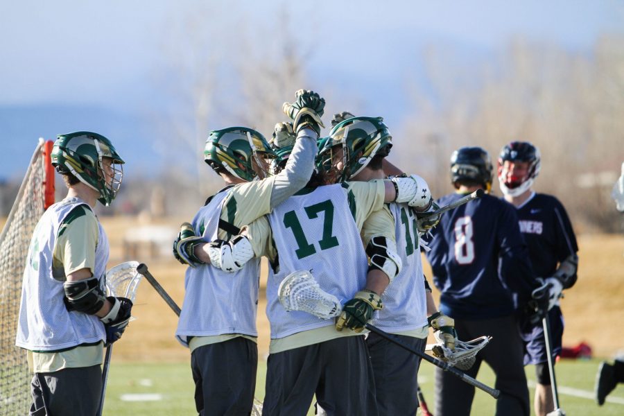 The Rams celebrate a goal against Metro State. The Rams beat the Roadrunners 18-6 in the first scrimmage of the season on Saturday, Feb. 3. (Ashley Potts | Collegian)