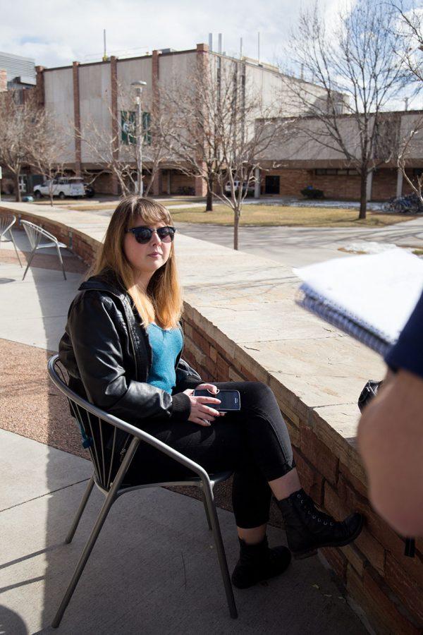 Political science major, Jessica Zamba, comments on the political change on campus while sitting outside the Behavioral Sciences Building. (Anna Baize | Collegian)