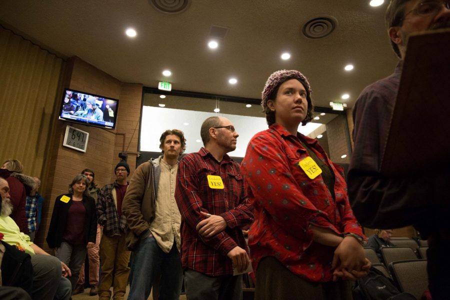 Macy Dallas waits in line to speak out about the new lockers during the Fort Collins City Council meeting February 6, 2018. (Anna Baize | Collegian)