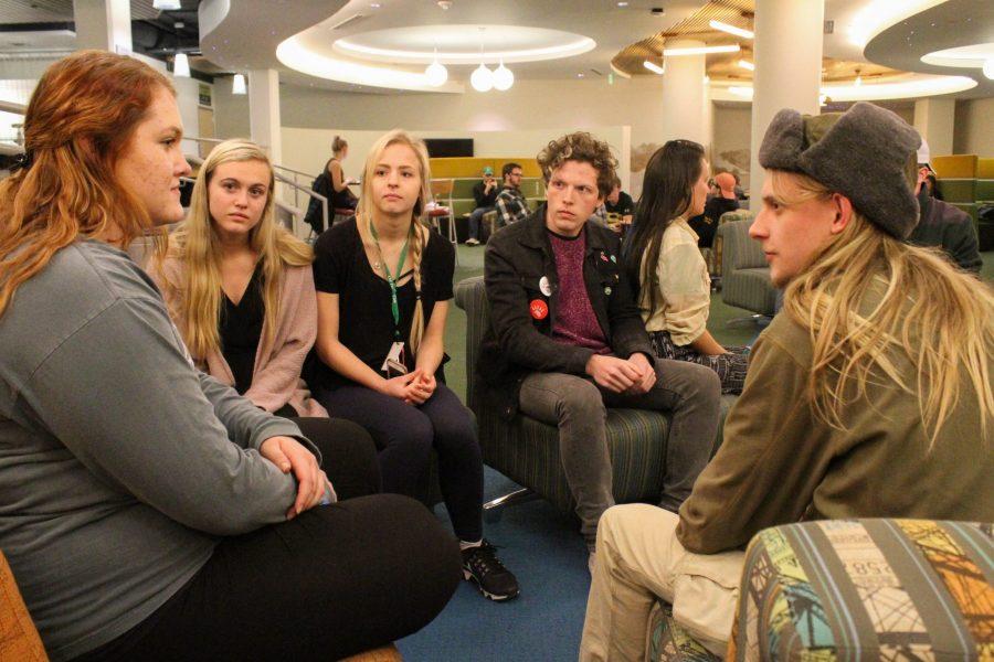 A group shares their thoughts at Coffee and Conversation, a discussion facilitated by CSUs chapter of Turning Point USA. The discussion invited students from varying political ideologies to share their thoughts and debreif after the events on Feb. 3. (Ashley Potts | Collegian)
