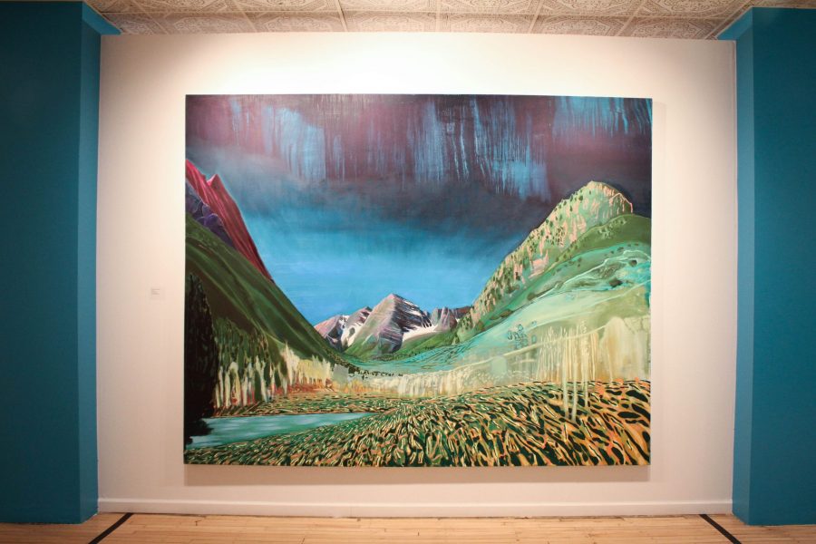 Sue McNallys Maroon Bells, Colorado piece hangs in the Fort Collins Museum of Art. The piece is part of a selection of McNallys This Land is My Land show, which focuses on landscapes in the Western United States. McNally is working on making this body of work represent landscapes in all 50 states. (Ashley Potts | Collegian)
