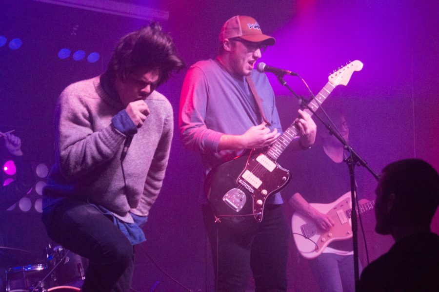 The band Places Back Home brought on a former band member to perform the last song of their set at Battle of the Bands Thursday evening. (Photo by Olive Ancell | Collegian)