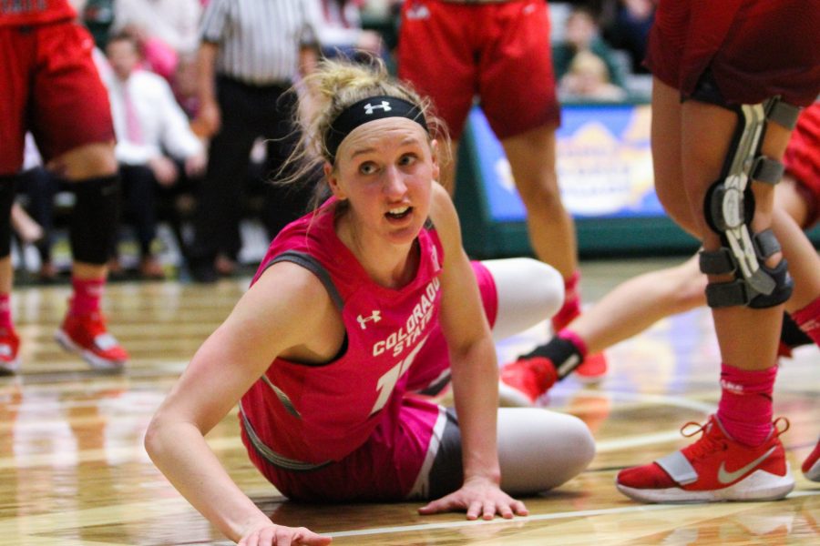 Hannah Tvrdy looks to see if the ref called a foul on a play that caused her to fall during the pink out game agaisnt Fresno State on Feb. 17. The Rams fells to the Bulldgos 75-64 in overtime. (Ashley Potts | Collegian)